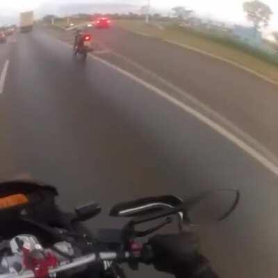 Tire flies and hits biker