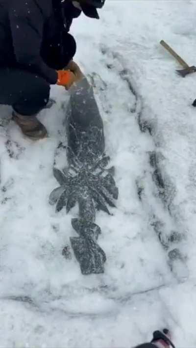 A guy is making a sword out of ice