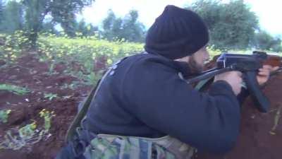 Close call for an FSA fighter caught in MG fire during a lively skirmish with the SAA near Azaz - 2013