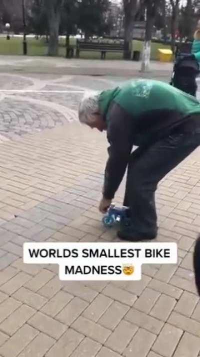 Riding world's smallest bike