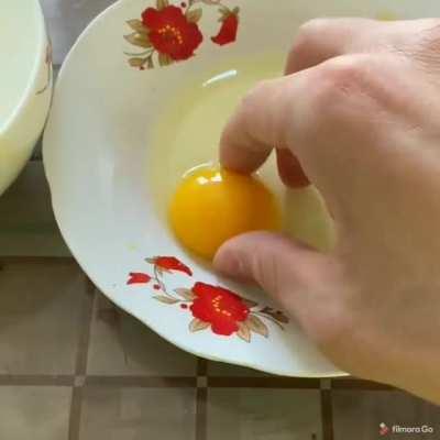 Apparently brush your fingers on a garlic clove with grant you the egg yolk separator ability