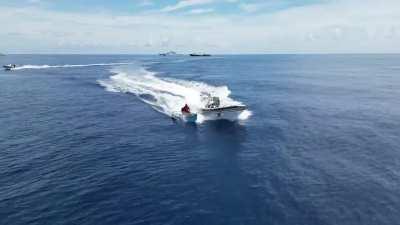 A brave Filipino fisherman outmaneuvering the Chinese Coast Guard inside the Philippine waters.