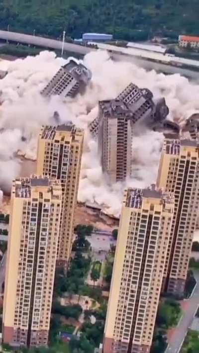 China demolishing unfinished high-rises buildings