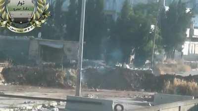 Syrian Army BMP-1 emerges from cover to duel with a pair of Opposition anti-tank teams - Baba Amr, Homs - 6/12/2012