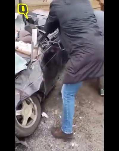 A Ukrainian civilian car was crushed by a tank that lost control, but remarkably, they survived after being saved by onlookers.