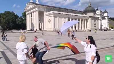 Older guy violated this person waving their flag