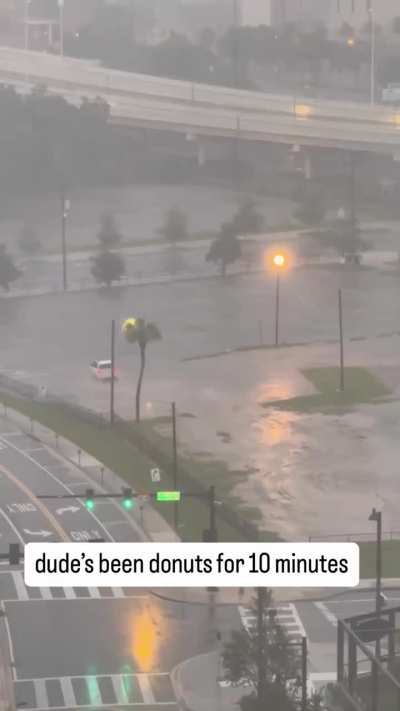 Dude doing donuts in downtown Tampa at the moment before Hurricane Milton hits