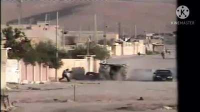 Found this insane video of failed car bomb attempt, Iraq, Tal afar 2006. The police officer died.