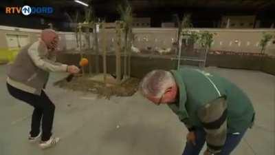 Chicken farmer laughing like a chicken