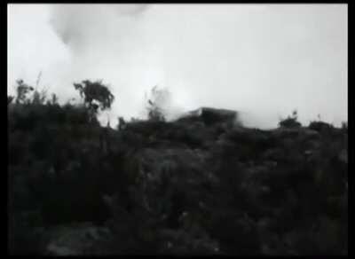 [Korean War] U.S. 2nd Infantry Division troops burns a bunker with grenades and flamethrowers during the Battle of Heartbreak Ridge, c. 1951