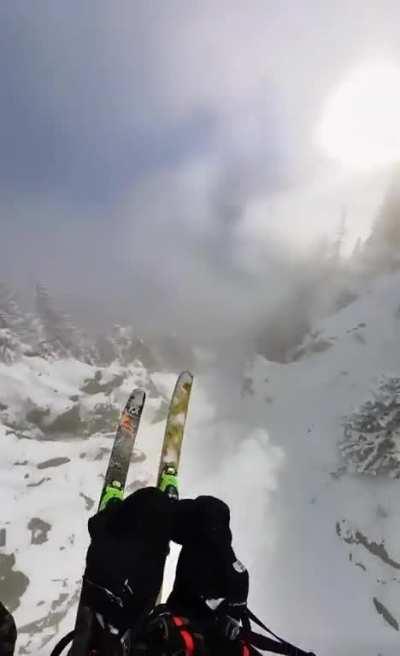 Skiing and parachuting at the same time