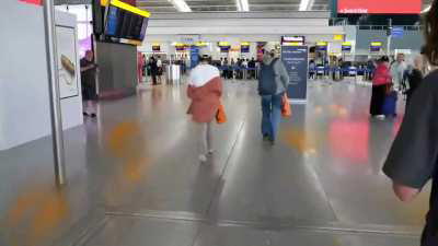 Just stop oil protesters sprays paint at Heathrow Airport in London