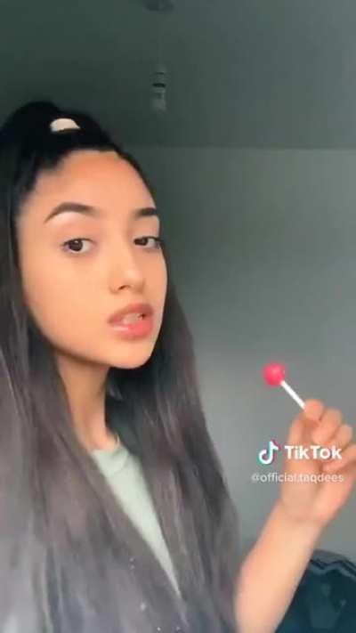 Spitting after sucking lollipop