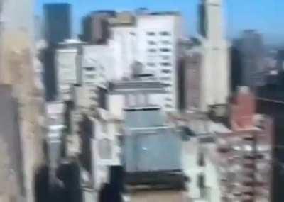 Student shoots a video as South Tower collapses