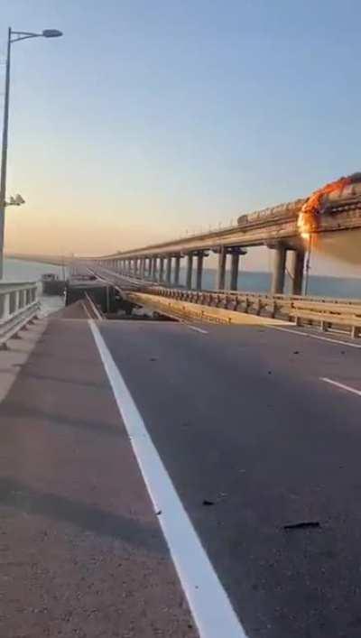 Closeup video showing aftermath of suspected UAF strike on the Kerch Strait bridge.