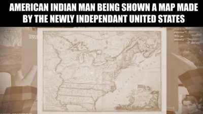 AMERICAN INDIAN MAN BEING SHOWN A MAP MADE BY THE NEWLY INDEPENDANT UNITED STATES