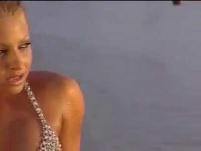 Trish Stratus in chainmail bikini