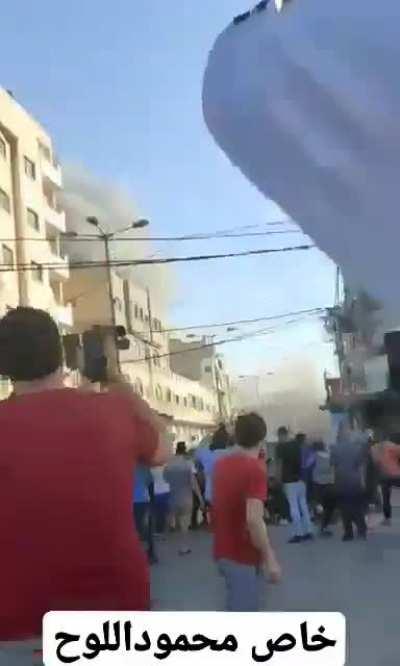 Bank in Gaza going down by Israeli air strike