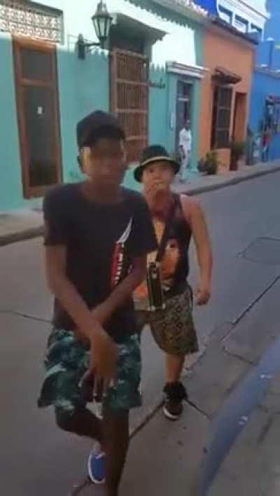 Street rappers freestyle in colombia.