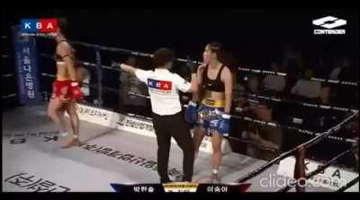 Kickboxer stops her kick...