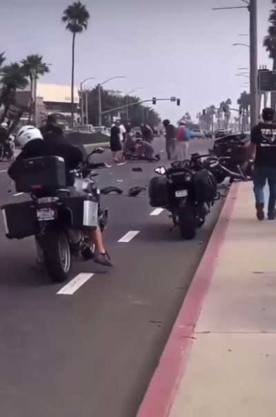 Motorcycle crashes into the back of a Honda 