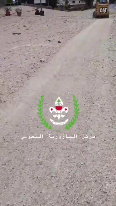 IDF bombs road (watermark from source)