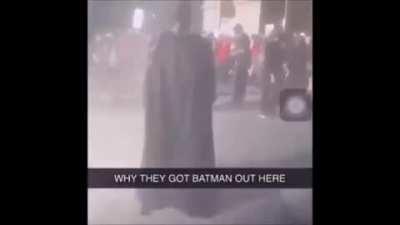 Batman has come out of his cave to join the riots!