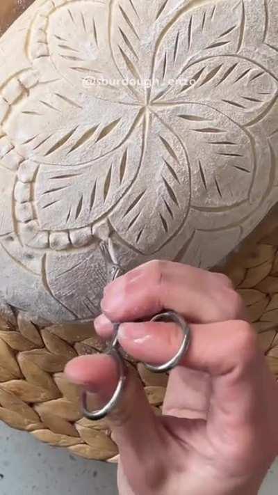 Baking a bread with engraved art