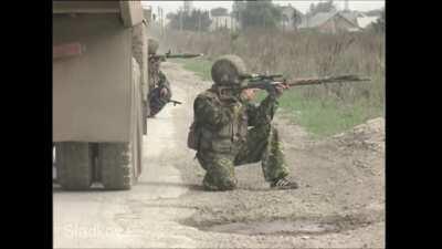 Russian soldiers engaging the Chechen militants.