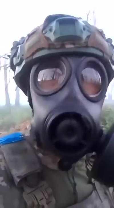 Colombian volunteer in gas mask states the Russian Military are now using chemical weapons in Ukrainian soil. He says regardless he is well equipped for this