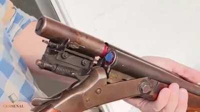 vintage shotgun, reloads automatically!