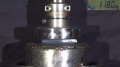 NOKIA 3310 getting crushed with hydraulic press