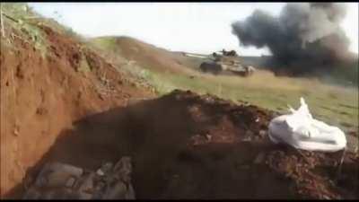 T-55 in Syria almost gets hit by enemy round (Note the Commander Jumping out in Fear)