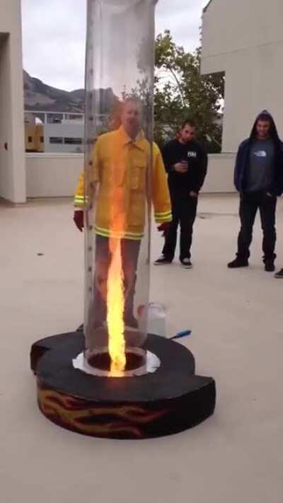 A Fire Instructor demonstrates the &quot;Chimney Effect&quot; to his trainees