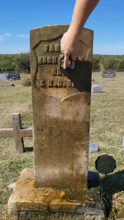 Cleaning an old headstone