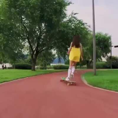 Korean longboard lass Hyojoo Ko gliding effortlessly through a local park in Seoul, South Korea (not mine)