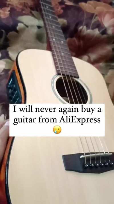 Never buy guitar from AliExpress!!!