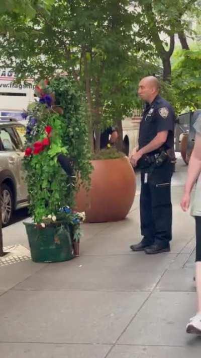 Ever seen a cop arguing with a potted plant?