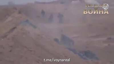 ISIS militants shoot the retreating Hezbollah fighters with tracers. Syria. Undated video