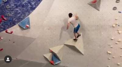 Setter showing off an interesting new boulder at my local gym