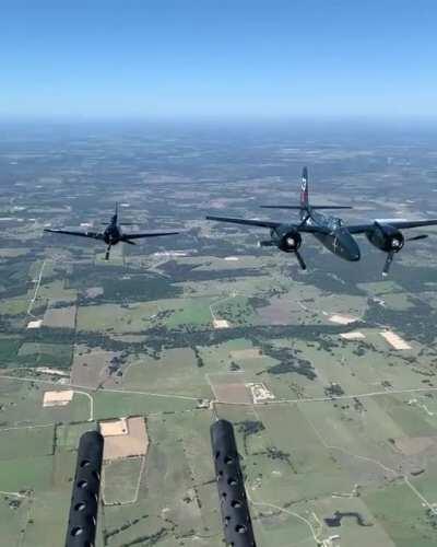 Behinds the scenes during my air to air photoshoot with the F8F Bearcat and the F7F Tigercat. [720x900]