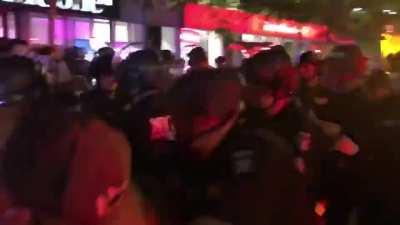 Protester aggressively provokes cops and gets arrested.