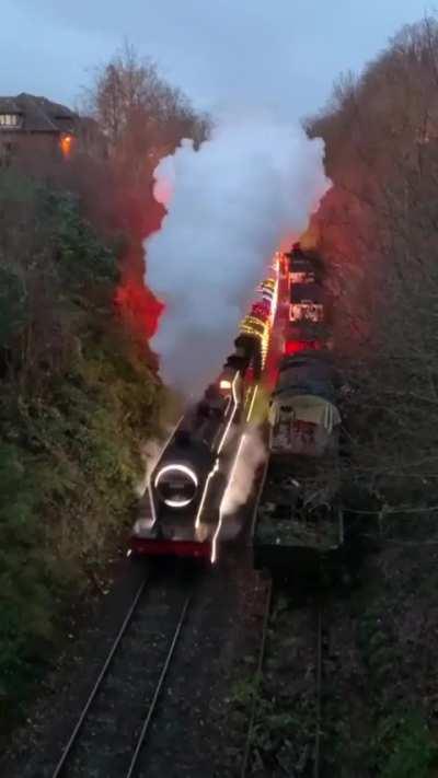 Christmas time. I never knew a train covered in Christmas lights before!