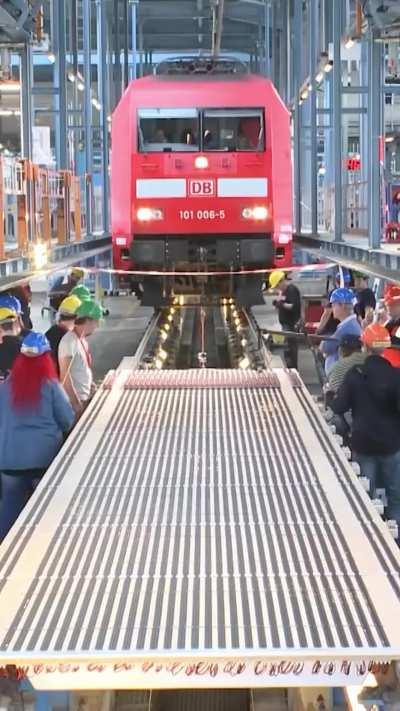 198 Toy Locomotives Pulling A Real Locomotive