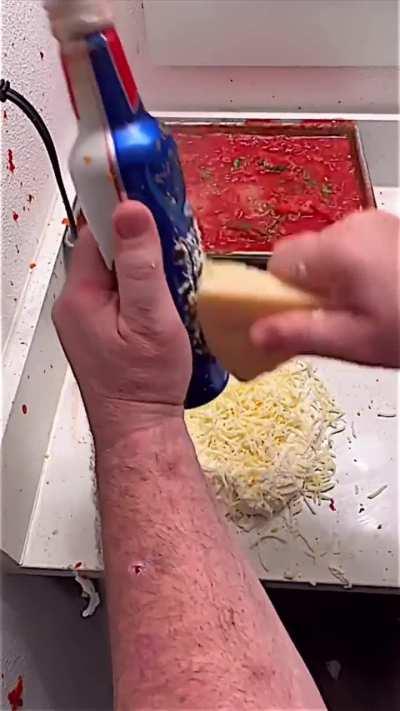 Man makes pasta in his hotel room