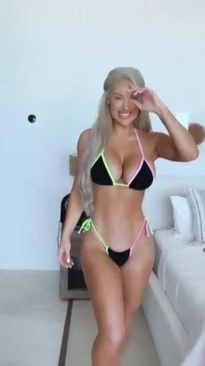 Modeling various bikini and swimwear outfits