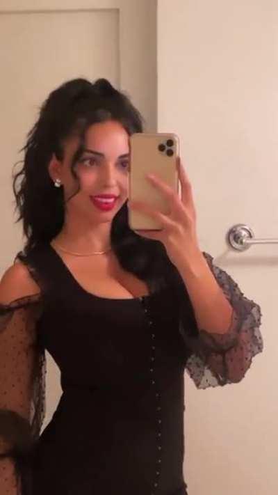 Black dress and curly hair (video)