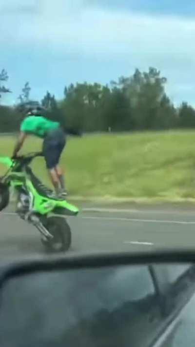 Just lane splitting and poppin wheelies in heavy traffic over a bridge with 20+ of my friends. WCGW?