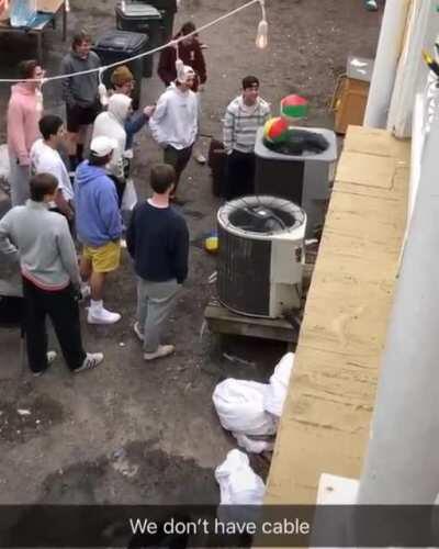 People watch beach balls battle it out