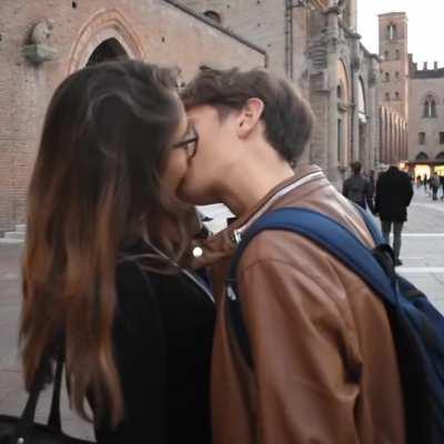 Italian guy kissing girl